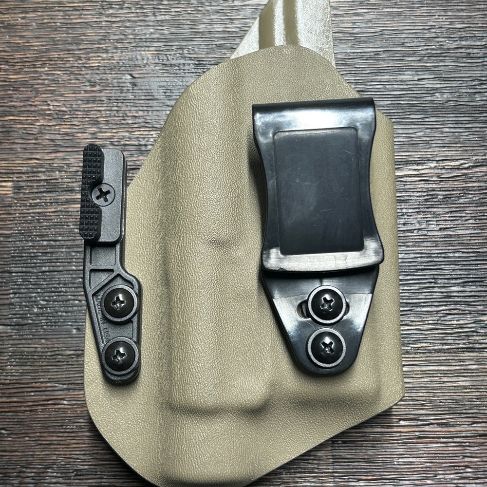 Kydex Glock Holster. Will fit 17/19 with TLR style light. Unknown brand.